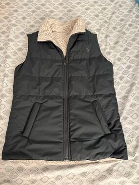 The North Face Black Puffer Vest with Cream Sherpa Collar two side wear